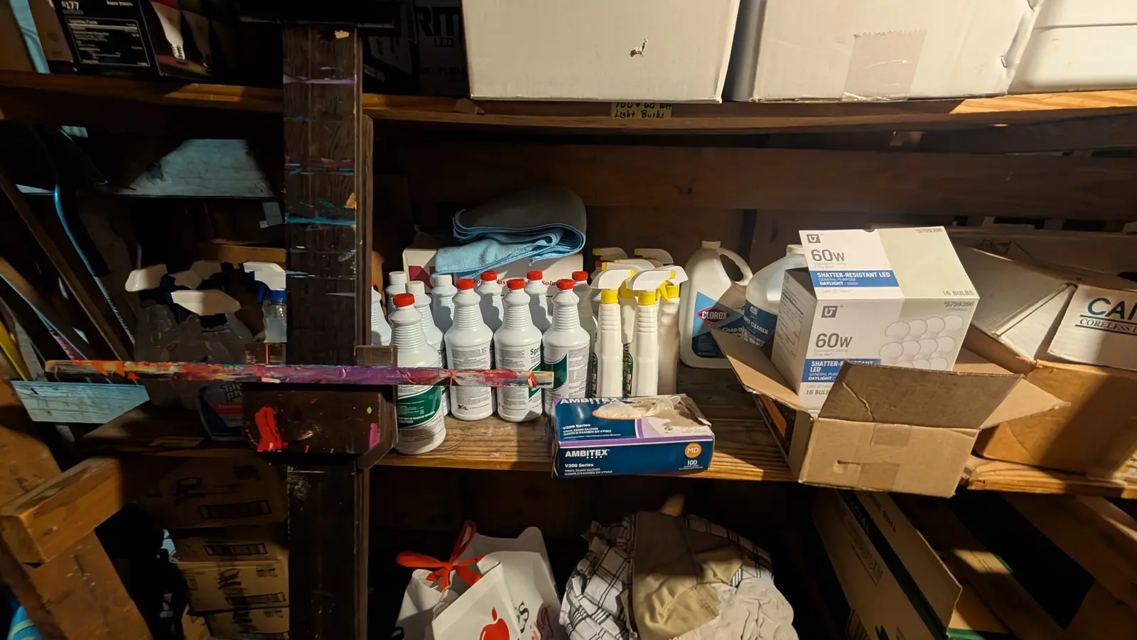 Additional cleaning inventory on the backstage shelves